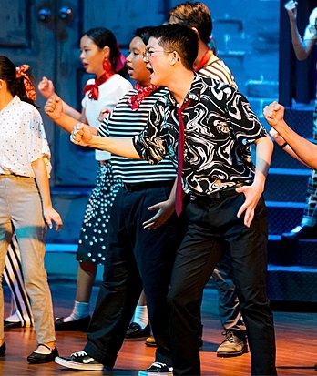 Group performance by pupils at Brighton College Vibhavadi, celebrating teamwork and creativity through performing arts education.