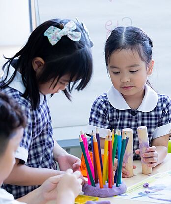 Nursery pupils working on an art project at Brighton College Vibhavadi, fostering expression and focus in a creative early years environment.