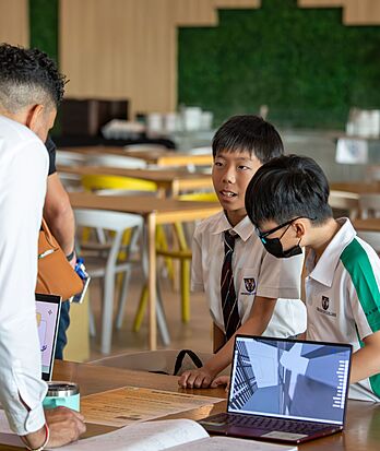 Nursery pupils presenting a simple technology project at Brighton College Vibhavadi, introducing communication and confidence from an early age.
