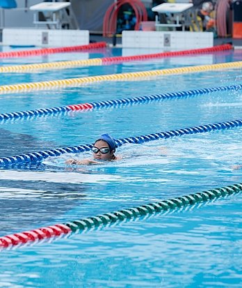 Prep pupil enjoying a swimming session at Brighton College Vibhavadi, where sport for all supports early physical development and water confidence.