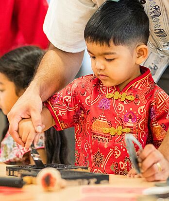 Pupil practicing Chinese writing at Brighton College Vibhavadi, supporting multilingual education at a top British international school in Thailand.