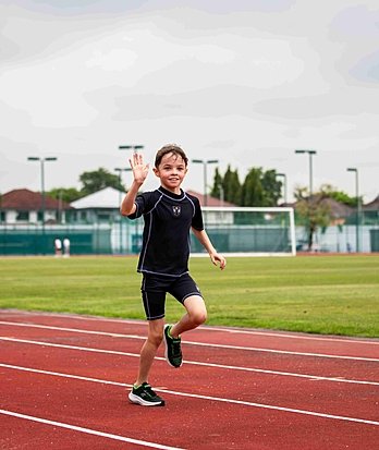 Pupil competing in athletics at Brighton College Vibhavadi, highlighting the school’s commitment to inclusive and competitive sports education.