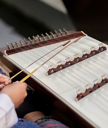 Pupils learning traditional Thai instruments in music class at Brighton College Vibhavadi, celebrating culture through creative and inclusive education.