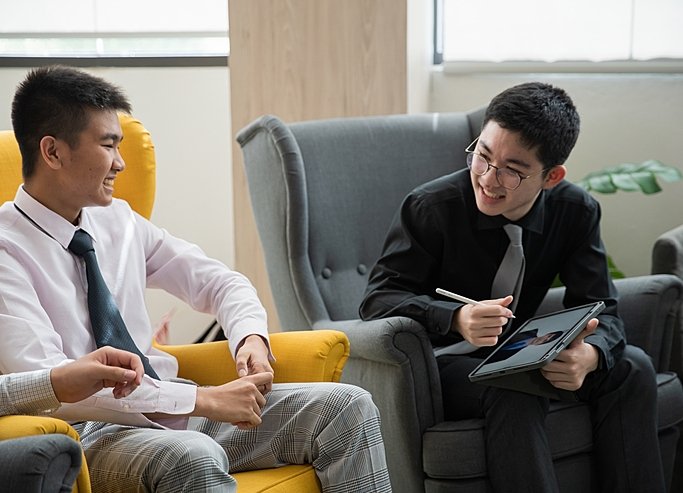  Pupils engaging in thoughtful discussion at Brighton College Vibhavadi, developing confidence and communication skills through enrichment activities. 