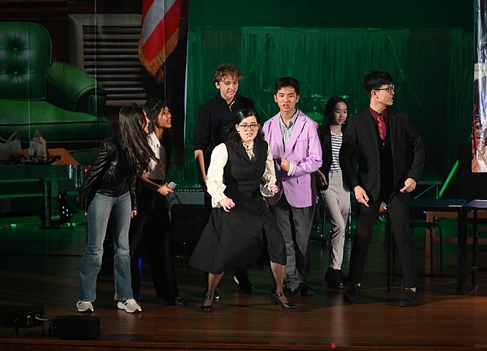  Pupils performing a group drama piece at Brighton College Vibhavadi, building teamwork and expression through holistic education. 