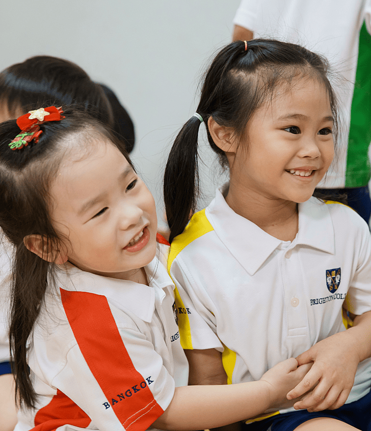  International school girls sharing a warm hug at Brighton College Vibhavadi, Thailand 