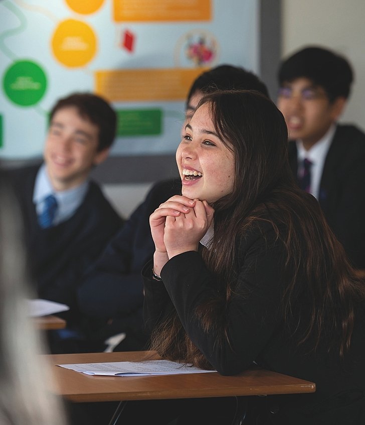  Happy Sixth Form pupils listening and learning in class at Brighton College Vibhavadi, where inspiring teaching fosters curiosity, confidence, and academic success. 