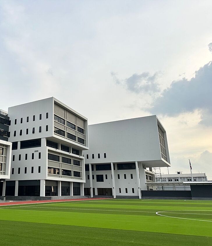  Modern school building at Brighton College Vibhavadi, an international school in Bangkok with easy transport access. 