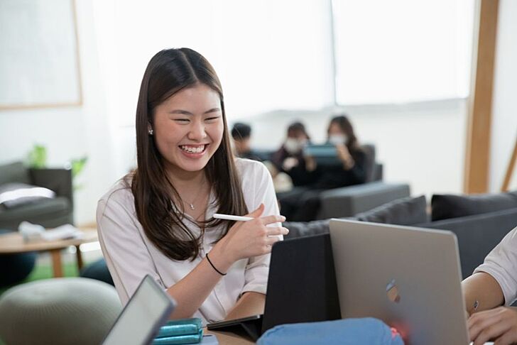  Brighton College Vibhavadi Sixth Form pupils working together, enjoying a nurturing learning environment that supports personal growth. 