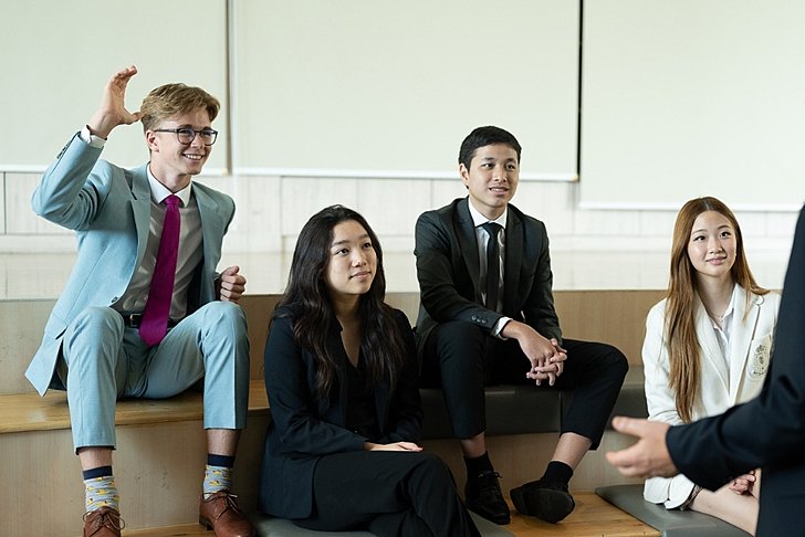  Sixth Form pupils seated in a focused setting at Brighton College Vibhavadi, reflecting an environment of academic maturity and personal growth. 
