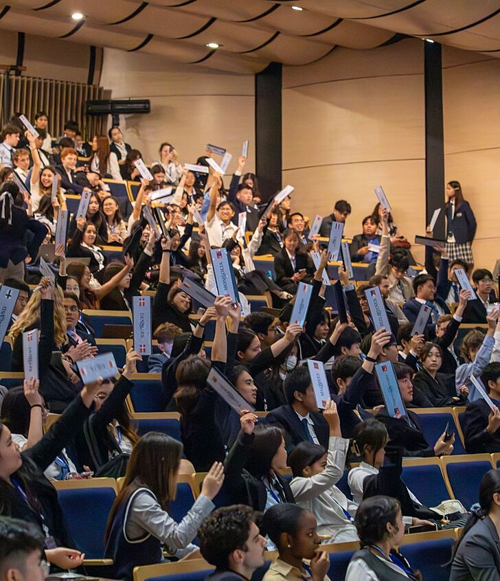  Pupils participating in a voting activity at Brighton College Vibhavadi, developing leadership and responsibility as part of a school for global citizens. 