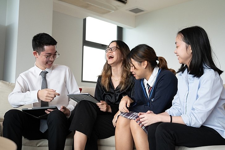  Pupils laughing and talking at Brighton College Vibhavadi, forming friendships in a warm and inclusive learning environment. 