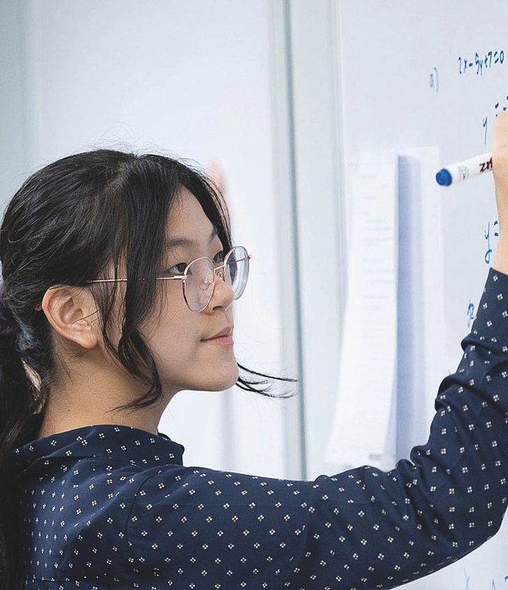  Pupils studying math together at Brighton College Vibhavadi, where academic challenge is met with teamwork and encouragement. 