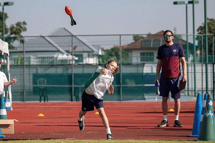  Pupils participating in a spear-throwing activity at Brighton College Vibhavadi, part of the school’s character-building outdoor programme. 
